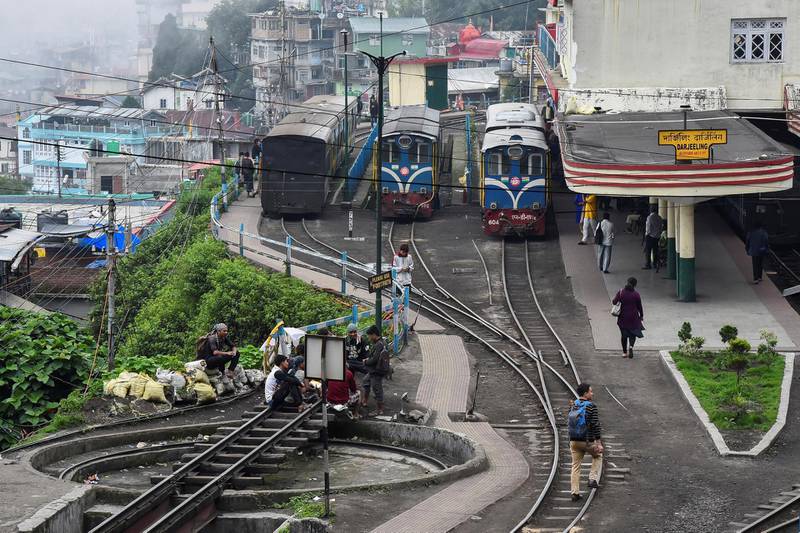 Darjeeling Himalayan Railway trains are seen at a station in Darjeeling.