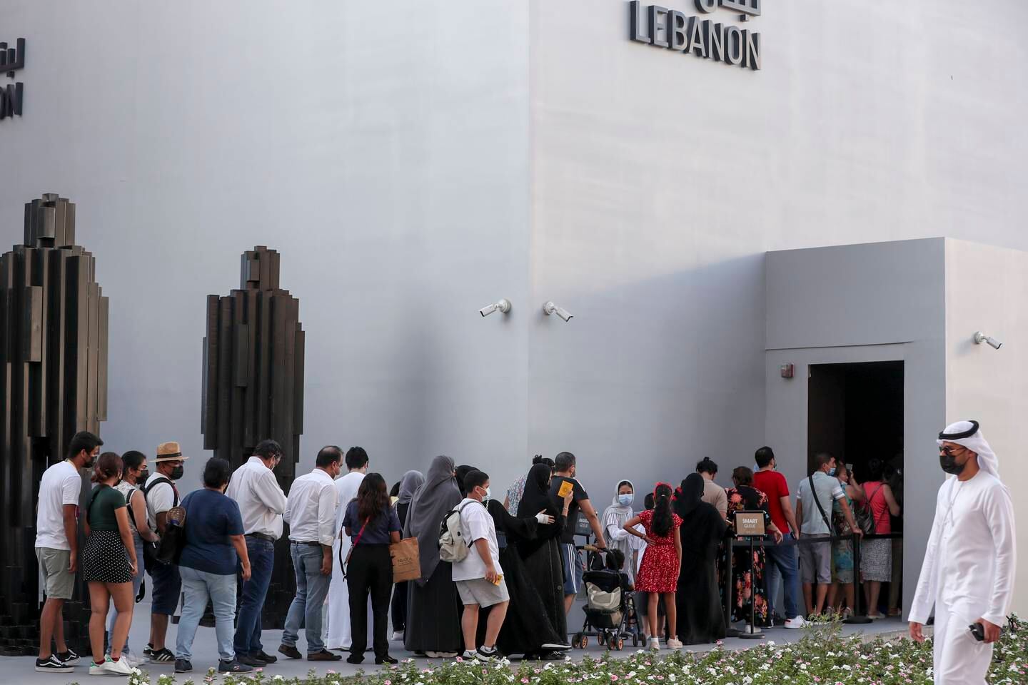 People wait to enter the Lebanon Pavilion at Expo 2020 Dubai. Khushnum Bhandari/ The National
