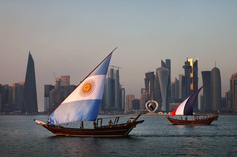 Boats with sails showing the flags of Argentina and France ahead of their Fifa World Cup final match. Getty