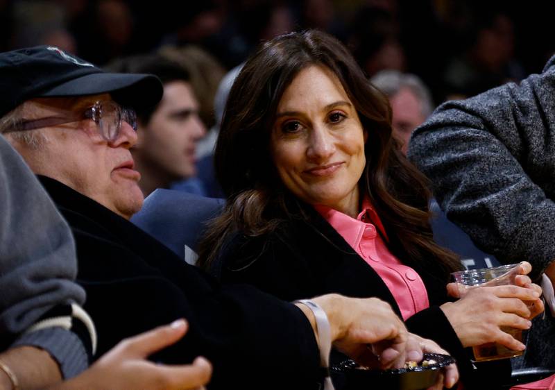Danny and Lucy DeVito watch the game between Sacramento Kings and LA Lakers in California. AFP