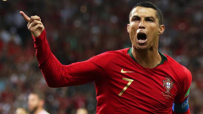 Cristiano Ronaldo was Portugal's hero with a hat-trick against Spain as they drew their opening Group B game 3-3. EPA