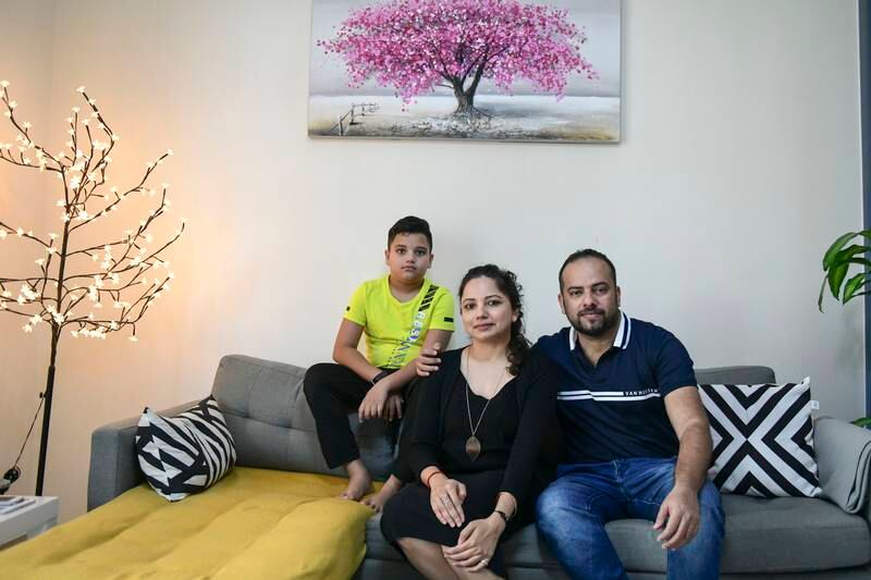 From left: Shaurya, Spandana Hegde and Vishwanath Shetty in their one-bedroom apartment Al Furjan, Dubai.