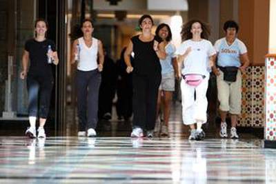 Mall walking is an increasingly popular form of exercise. A 30-minute speed walk that includes stair and escalator climbing can burn around 200 calories.