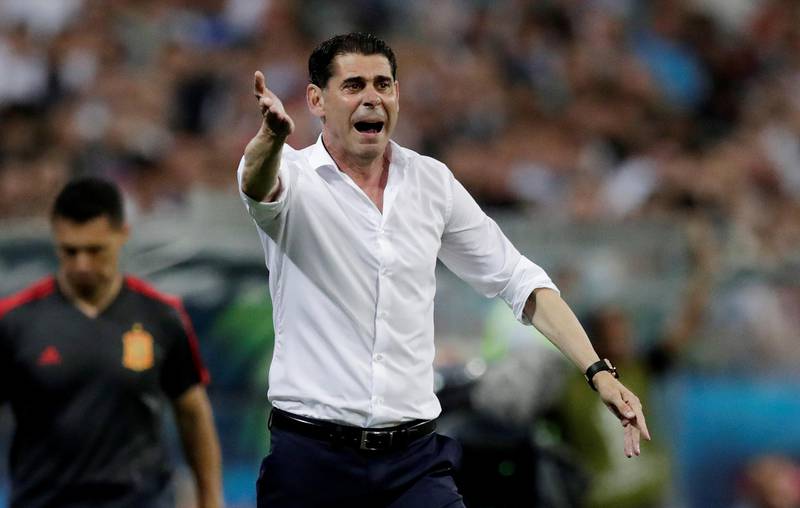Spain coach Fernando Hierro shouts out orders to his team. Hierro was taking charge of his first game after the surprise firing of Julen Lopetegui. Ueslei Marcelino / Reuters