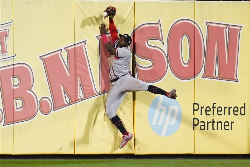 Atlanta Braves centre fielder Michael Harris II cannot hang onto a ball from Philadelphia Phillies designated hitter Bryce Harper for a double run battled in during the seventh inning in Game 3 of baseball's National League Division Series, in Philadelphia. AP