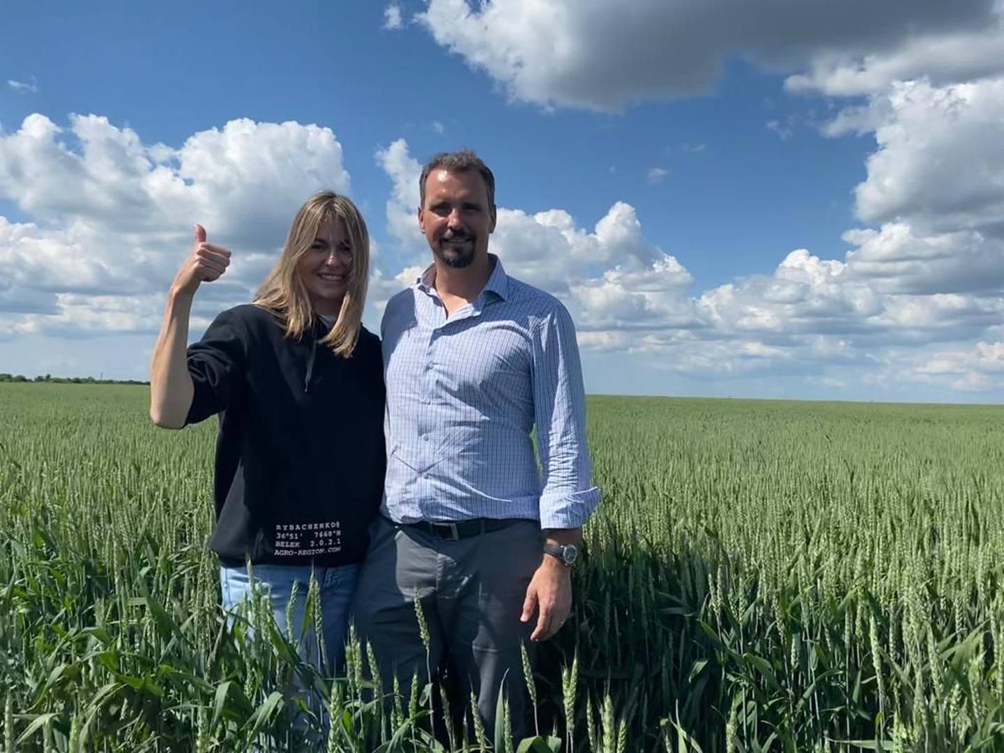 Aivaras Abromavicius in a field in Ukraine, with wife Kateryna Rybachenko, who is chief executive of three farms they run. Photo: Aivaras Abromavicius