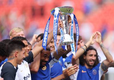 Chelsea right-back Reece James lifts the Summer Series trophy at FedEx Field in Landover, Maryland. AFP