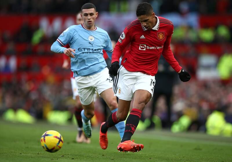 Manchester United's Raphael Varane in action against Manchester City's Phil Foden. EPA