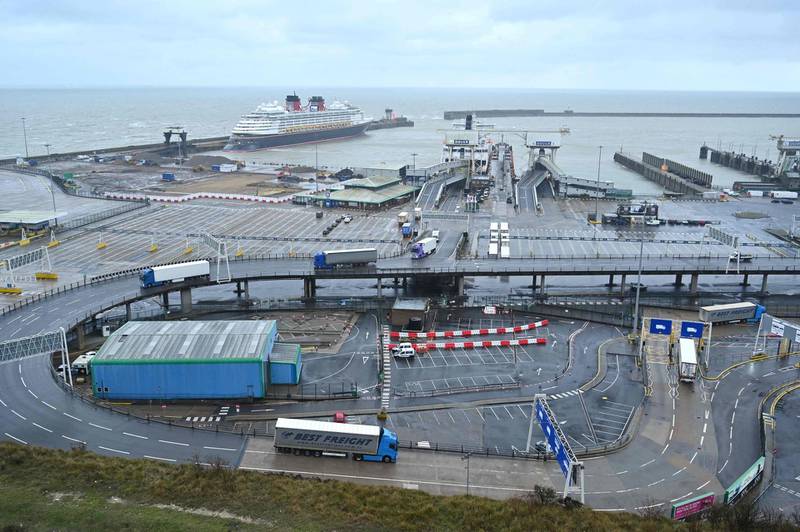 (FILES) In this file photo taken on January 04, 2021 a lorries enter the Port of Dover, southeast England following Britain's departure from the European Union. Exports of British goods to the European Union collapsed by a record 41 percent in January after the nation finalised its divorce from the bloc, official data showed on March 12, 2021. / AFP / Glyn KIRK
