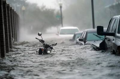 Flood waters move on the street, in Pensacola, Florida after the passing of Hurricane Sally in September 2020. AP Photo