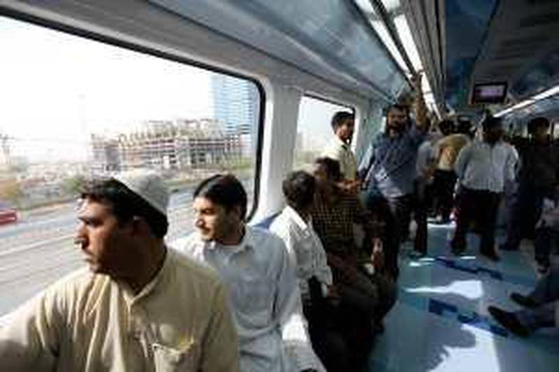 DUBAI, UNITED ARAB EMIRATES, April 30: People traveling in the metro in Dubai.  Seven more metro stations opened in Dubai today. (Pawan Singh / The National) For News. Story by Wafa