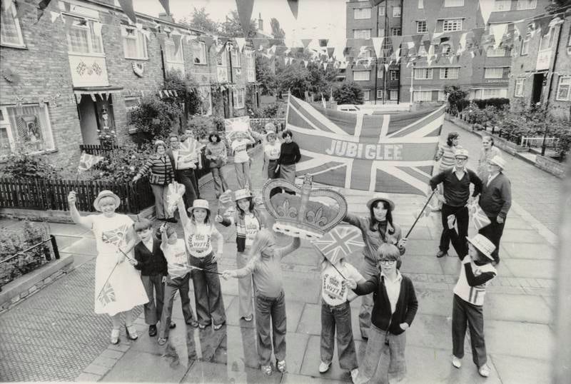 Residents in celebrate in Brixton, south London, after they won a competition for the best decorated street to celebrate the silver jubilee in June 1977.