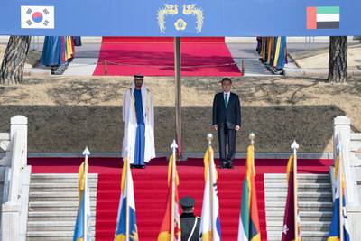 SEOUL, REPUBLIC OF KOREA (SOUTH KOREA) - February 27, 2019: HH Sheikh Mohamed bin Zayed Al Nahyan, Crown Prince of Abu Dhabi and Deputy Supreme Commander of the UAE Armed Forces (L) and HE Moon Jae-In, President of South Korea (R), stand for a national anthem during a reception, at the Blue House.

( Hamad Al Mansoori / Ministry of Presidential Affairs )
---