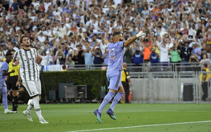 Karim Benzema celebrates after scoring a penalty against Juventus. Getty
