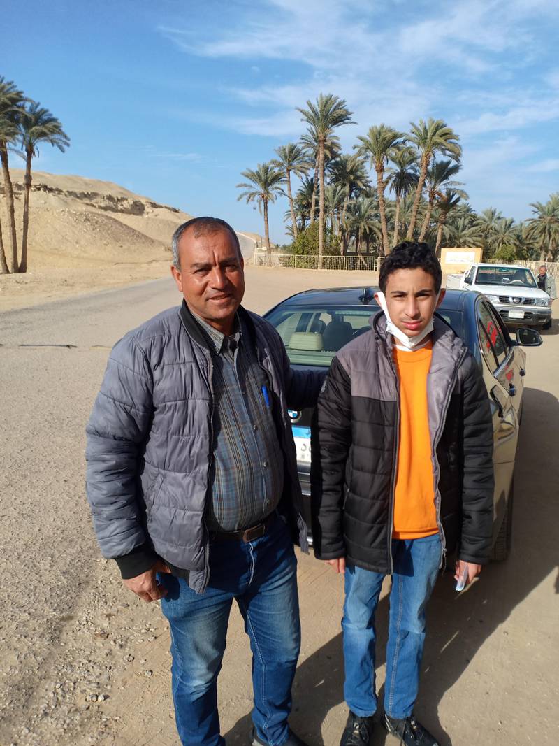 Young Egyptologist Youssef with Dr Sabry Farag, the general director of the Saqqara antiquities area, which he visited during his school holiday. Photo: Sami Hawas
