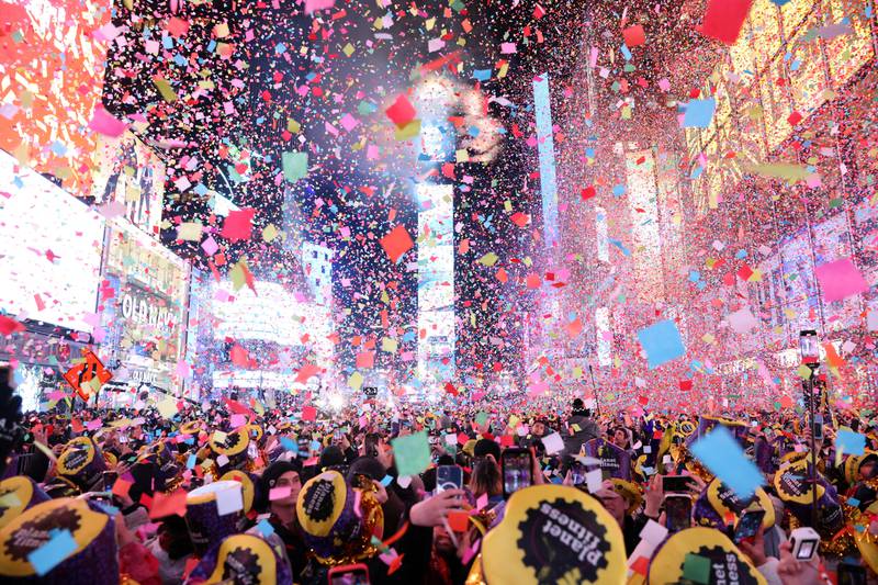Confetti flies at the first public New Year's Eve event since the Covid-19 pandemic in Times Square, New York. Reuters