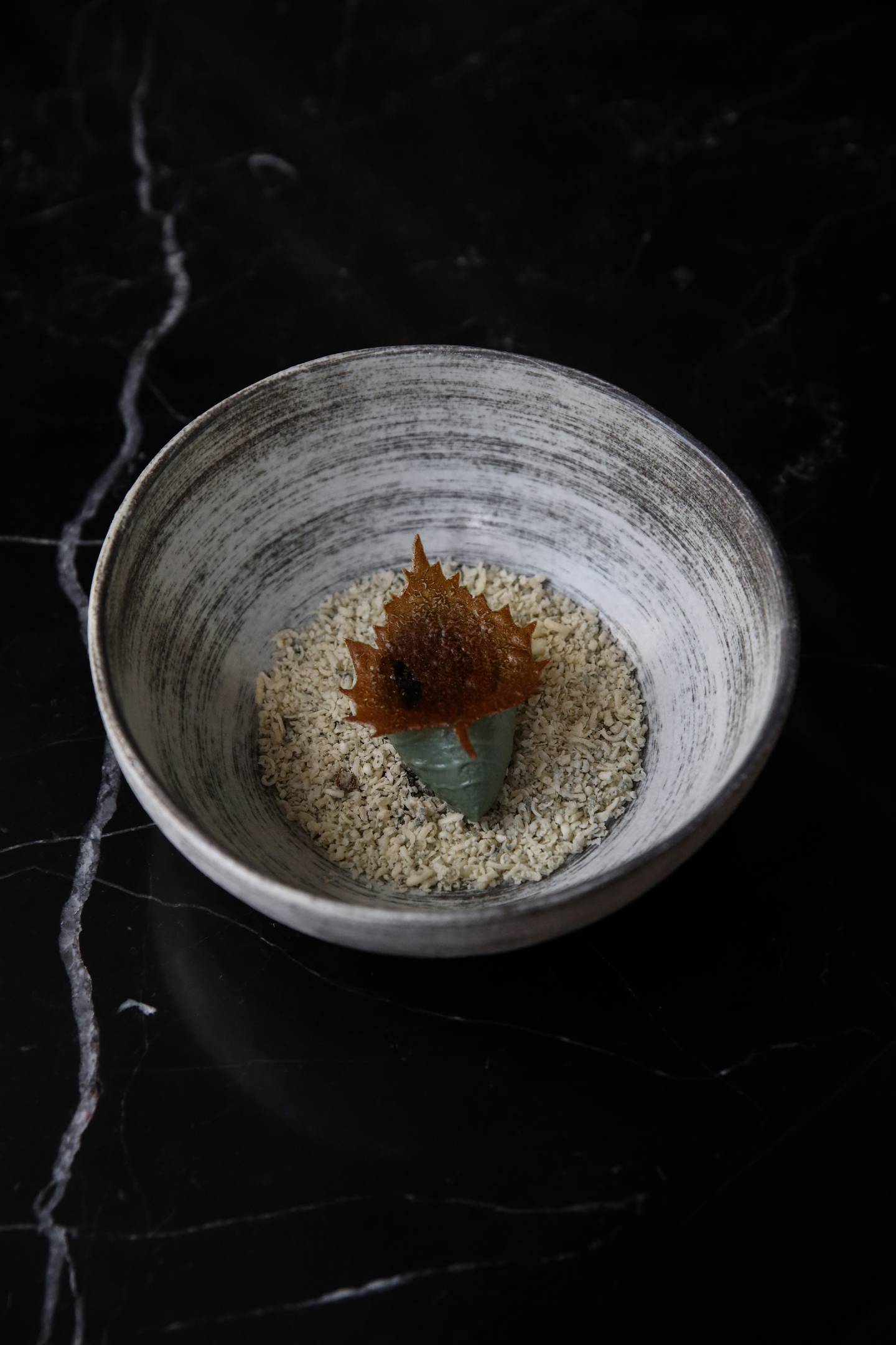Blue cheese and oxidised sunflower seeds by chef Mikael Svensson. Photo: Flavel Monteiro