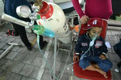 A young earthquake survivor receives medical attention at the Moh Ruslan hospital in Mataram.  AFP Photo
