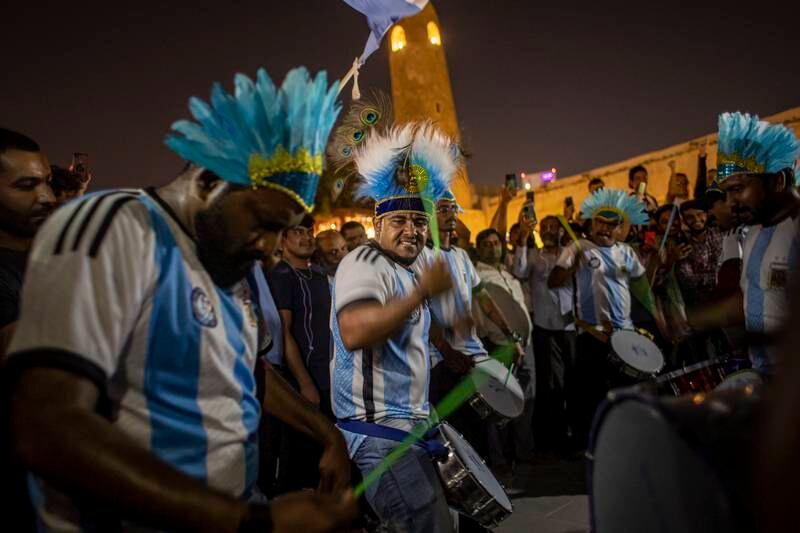 Argentinian fans drum roll at the Souq Waqif market area in Doha, Qatar. EPA