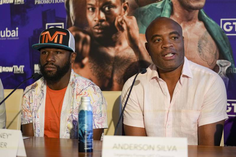 Floyd Mayweather, left, and Anderson Silva while promoting the Global Titans Fight Series. AFP