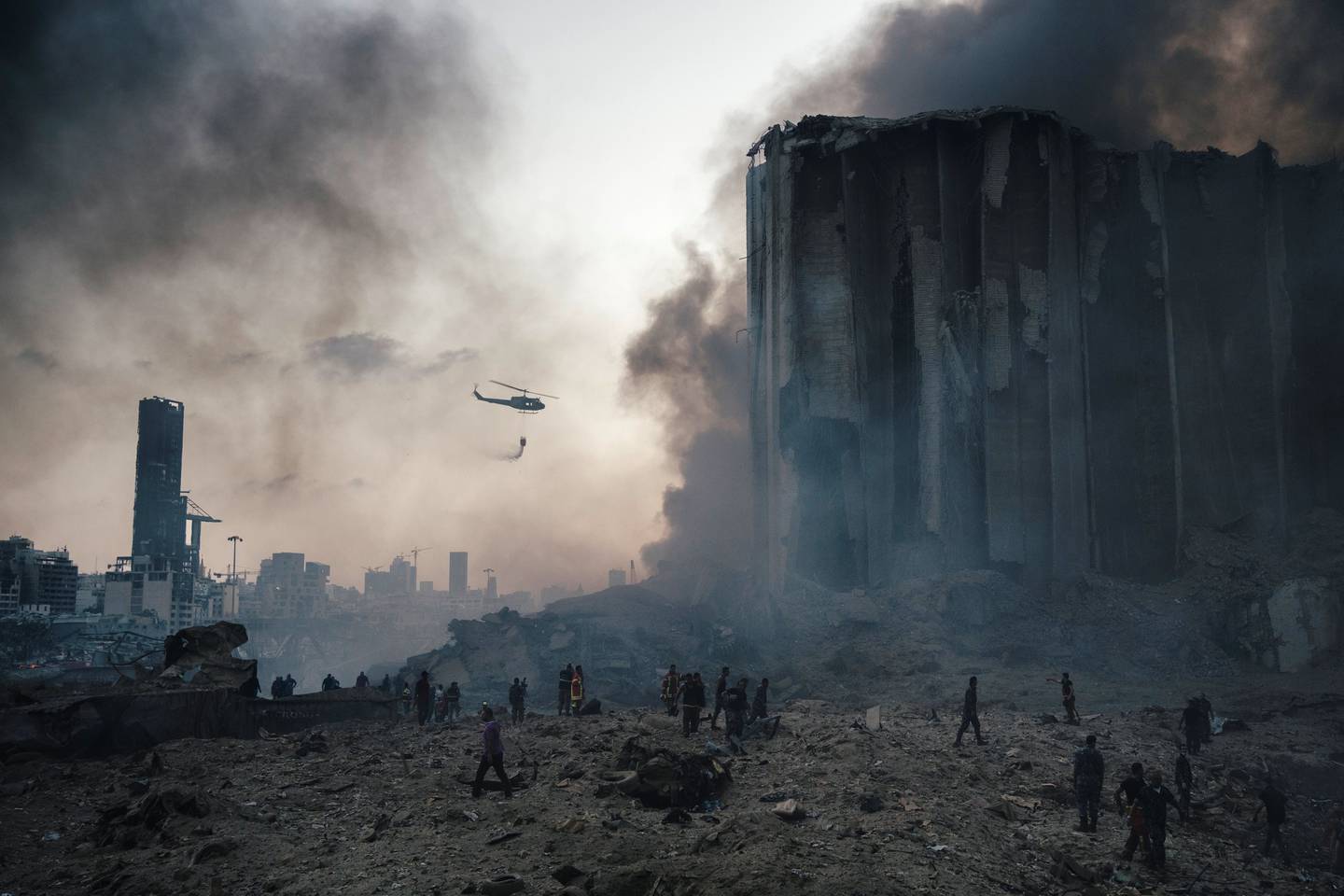 BEIRUT, LEBANON - AUGUST 4:Firefighters work to put out the fires that engulfed the warehouses in the port of Beirut after the explosion. (Photo by Lorenzo Tugnoli/ Contrasto for The Washington Post)