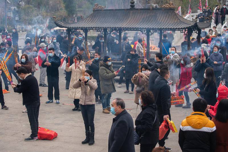 People pray at a temple in Shanghai, China. Today marks the fifth day of Spring Festival celebrations in China. Getty Images