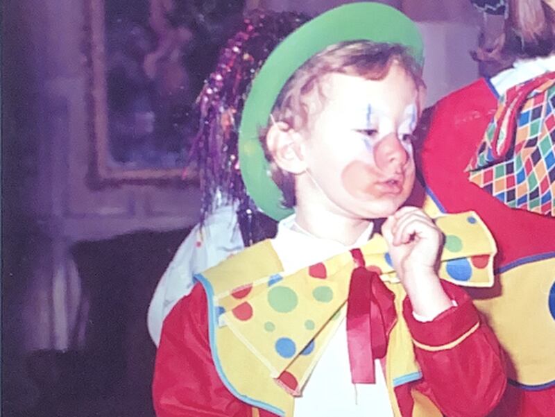 Camilla Fayed, in clown costume above as a child, has many of her father's traits and penchants, from theatricality and a passion for business to creating experiences and providing hospitality.