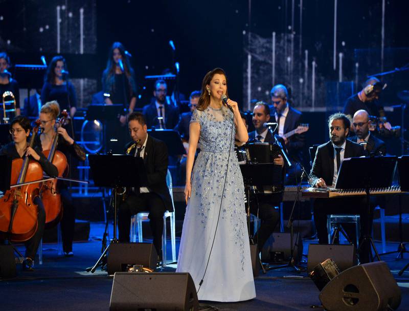 A sky-blue embellished dress from the collection of Lebanese singer Majida El Roumi is predicted to sell for £8,000-£10,000 ($10,500-$12,800). Courtesy Sotheby's