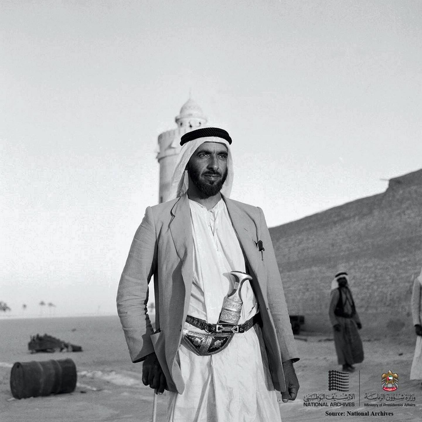 Shaikh Zayed wearing a jacket on top of his kandura as was customary in the 1950s. Photo via National Archives 