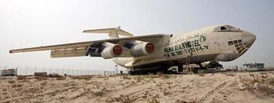 Umm al Quwain - August 4, 2009 - A cargo plane once owned by former arms dealer Victor Bout in a lot along the coastal highway near Umm al Quwain, August 4, 2009. (Photo by Jeff Topping/The National) *** Local Caption ***  JT002-0804-AIRPLANE_F8Q4323.jpg