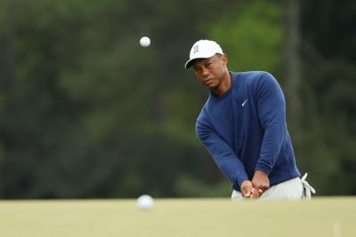 Tiger Woods plays a shot during a practice round prior to the 2023 Masters Tournament at Augusta National Golf Club. AFP