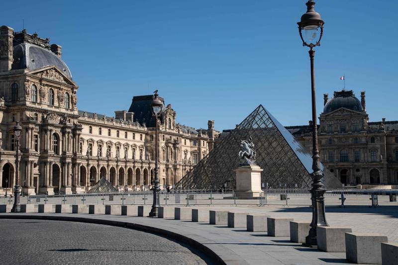 A picture taken on March 23, 2020, in Paris, shows the Louvre pyramid designed by Ieoh Ming Pei, on the seven day of a strict lockdown in France aimed at curbing the spread of COVID-19 caused by the novel coronavirus. RESTRICTED TO EDITORIAL USE - MANDATORY MENTION OF THE ARTIST UPON PUBLICATION - TO ILLUSTRATE THE EVENT AS SPECIFIED IN THE CAPTION
 / AFP / BERTRAND GUAY / RESTRICTED TO EDITORIAL USE - MANDATORY MENTION OF THE ARTIST UPON PUBLICATION - TO ILLUSTRATE THE EVENT AS SPECIFIED IN THE CAPTION
