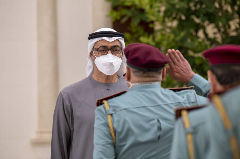 President Sheikh Mohamed bin Zayed receives a salute from a mourner during condolences for Sheikh Khalifa at Al Mushrif Palace.