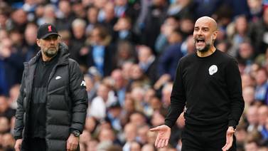 An image that illustrates this article Guardiola and Klopp play down pressure as title race reaches thrilling climax