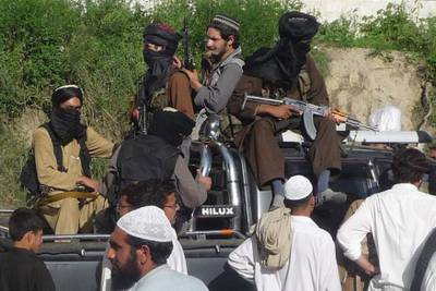 Pakistani Taliban fighters sit in the back of a pickup truck in 2009. Nine militants from the Tehreek-e-Jihad group were killed in an attack on an air force base in Punjab province early on Saturday. Reuters