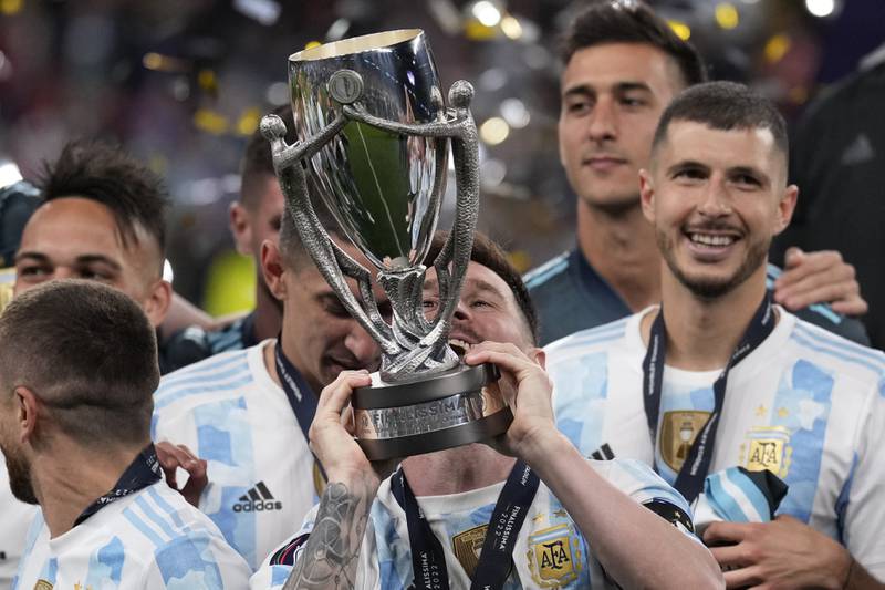 Messi celebrates with his teammates. AP