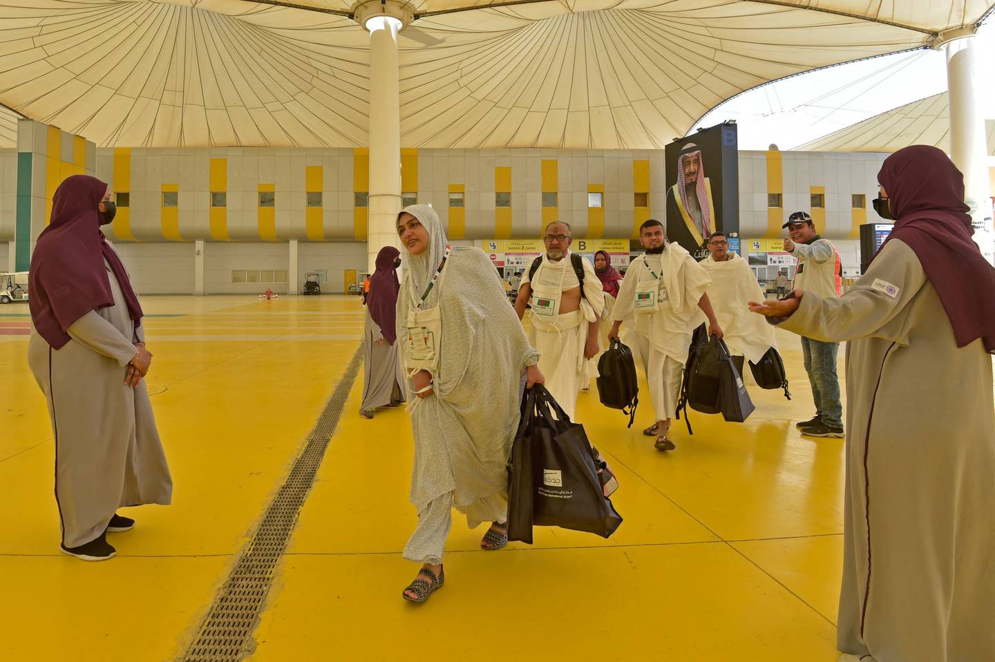 Pilgrims arrive at King Abdulaziz International Airport in Jeddah on Sunday. Photo: AFP