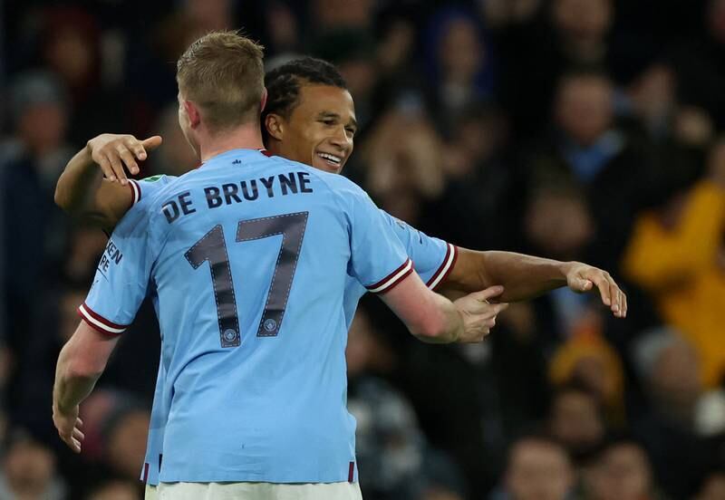 Manchester City's Nathan Ake celebrates scoring the third goal with Kevin De Bruyne. Reuters