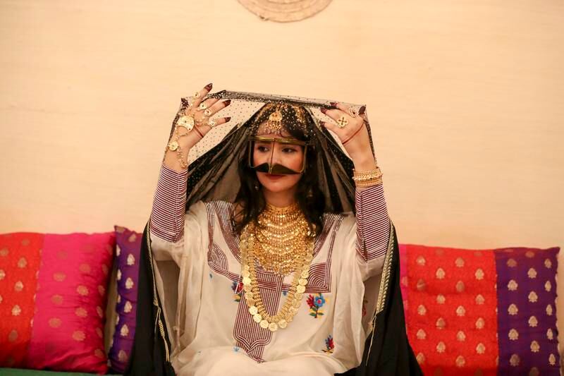 Actor Huda Ahmad portrays a UAE bride for photos with the public.