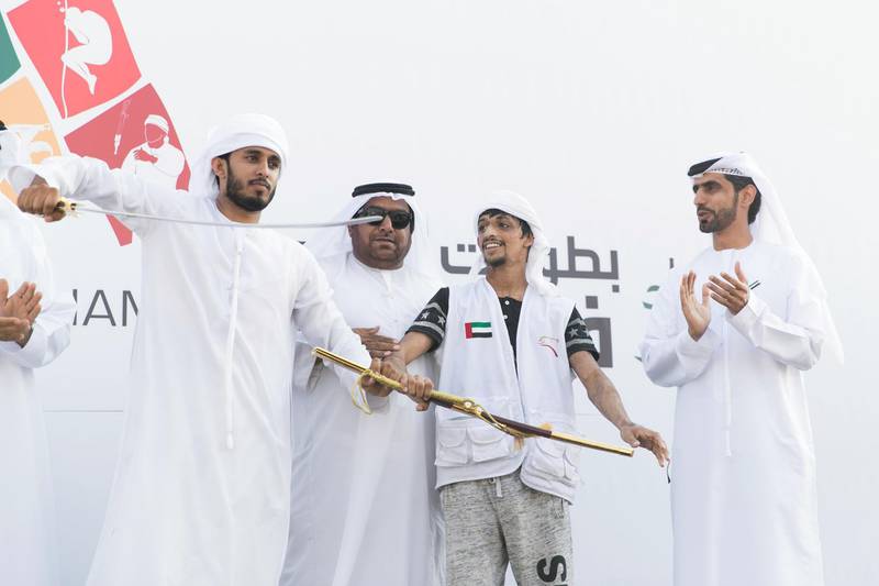 DUBAI, UNITED ARAB EMIRATES - DEC 3, 2017

Ghadayir Al Buloushi, 2nd to right, wins first place at the third edition of the National Day Camel Marathon. Organised by the Hamdan Bin Mohammed Heritage Centre, HHC, in co-operation with the Dubai Camel Racing Club, celebrates UAE’s 46th National Day, at Dubai International Endurance City, Saih Al Salam.

(Photo by Reem Mohammed/The National)

Reporter:  ANNA ZACHARIAS
Section: NA