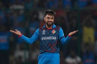 Afghanistan's Rashid Khan celebrates the wicket of India's Ishan Kishan. AP