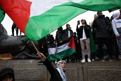 People take part in a March For Palestine in London. AFP