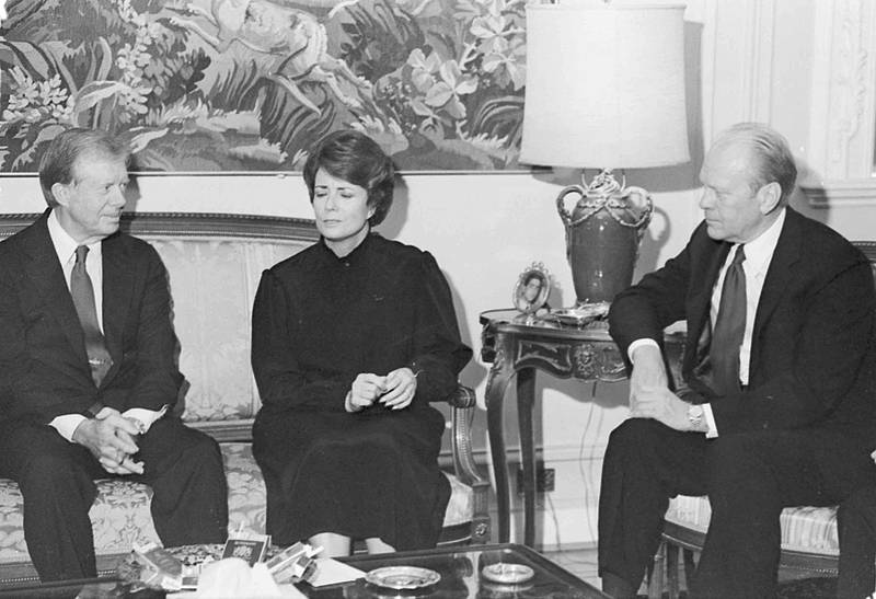 Jehan Sadat meets with former US presidents Jimmy Carter, left, and Gerald Ford at her Giza home, following the assassination of her husband, Egyptian president Anwar Sadat, in October 1981.