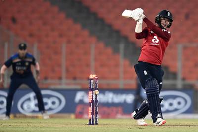 England batsman Sam Curran is clean bowled by India's Hardik Pandya for three at the Narendra Modi Stadium. AFP