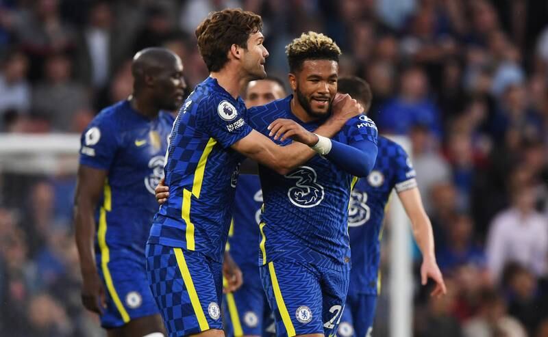 Marcos Alonso celebrates with teammate Reece James after scoring. EPA