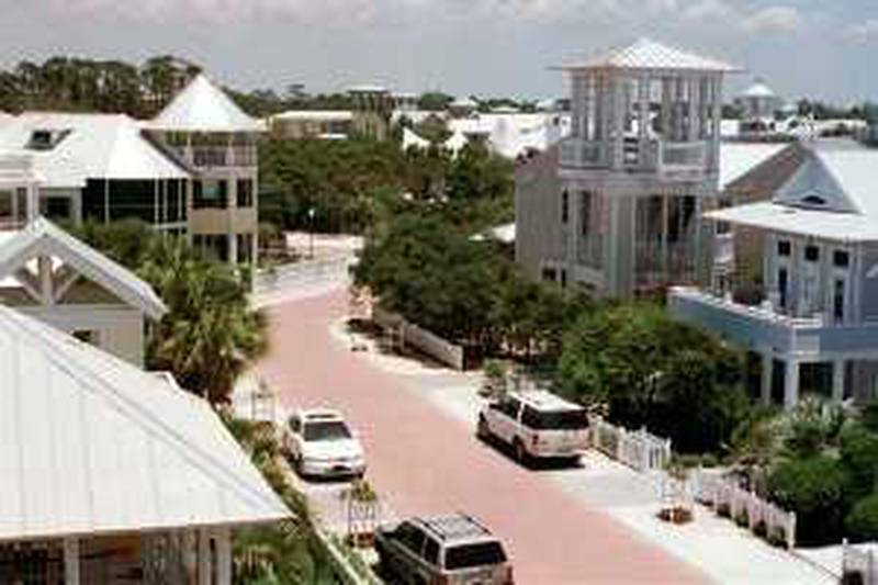 **FILE** Seaside, Fla., is shown in this June 19, 1998, file photo. With life on north Florida's sugary soft beaches made less appealing by recent hurricanes, developers are trying something new _ bringing beach-front quality development 15 miles inland. A development in Freeport, Fla. will offer the trendy, style of development known as "New Urbanism"  found at Seaside with its Victorian beach cottages surrounding an open town square with small tourists shops. (AP Photo/Bill Kaczor)