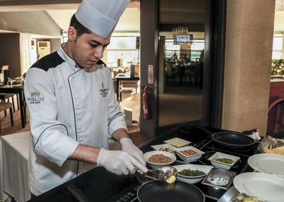 Abu Dhabi, U.A.E., May 21, 2018. InterContinental Abu Dhabi.  BYBLOS Arabic Restaurant meal preparations by chef and staff for Iftar.  Chef Raed Zeytoun prepares freekeh risotto. Victor Besa / The NationalSection:  WeekendReporter:  Saeed Saeed