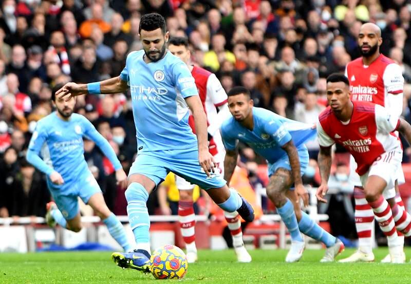 Riyad Mahrez of Manchester City scores the equaliser. EPA