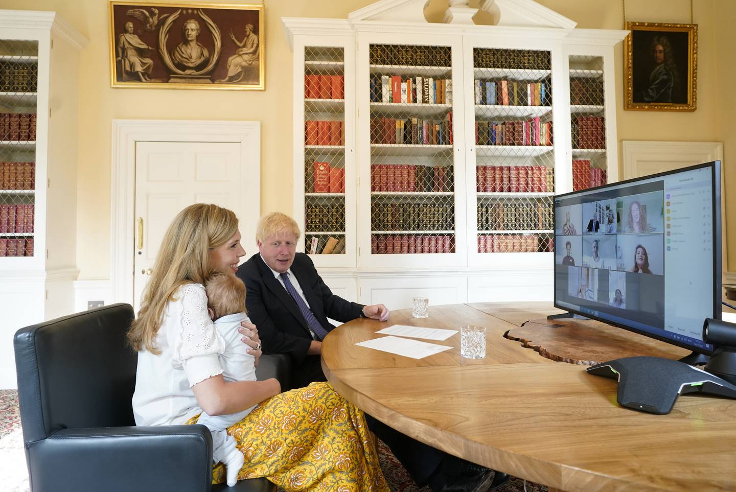Embargoed until 2200 18072020….14/07/2020. London, United Kingdom. Boris Johnson and Carrie NHS Call.The Prime Minister Boris Johnson and his partner Carrie Symonds with their son Wilfred in the study of No10 Downing Street speaking via zoom to the midwifes that helped deliver their son at the UCLH. Picture by Andrew Parsons / No 10 Downing Street