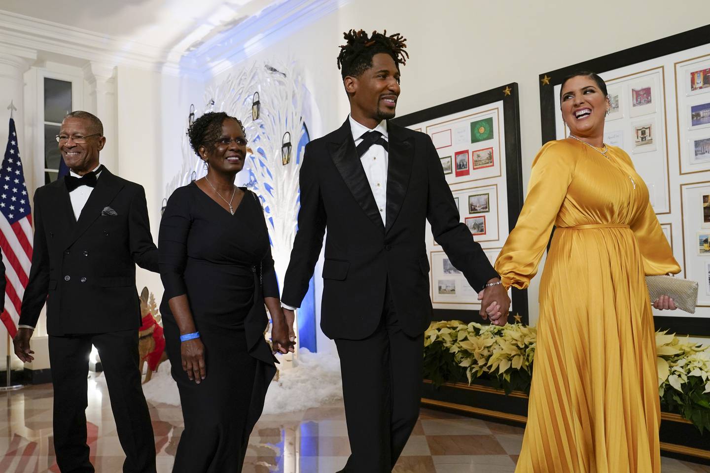 Musician Jon Batiste arrives with his wife Suleika Jaouad and family members. AP Photo